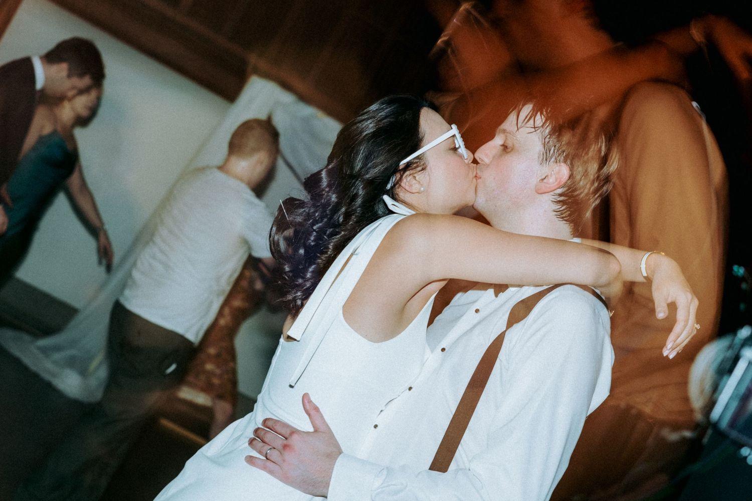 A tender moment shared during a wedding dance celebration.
