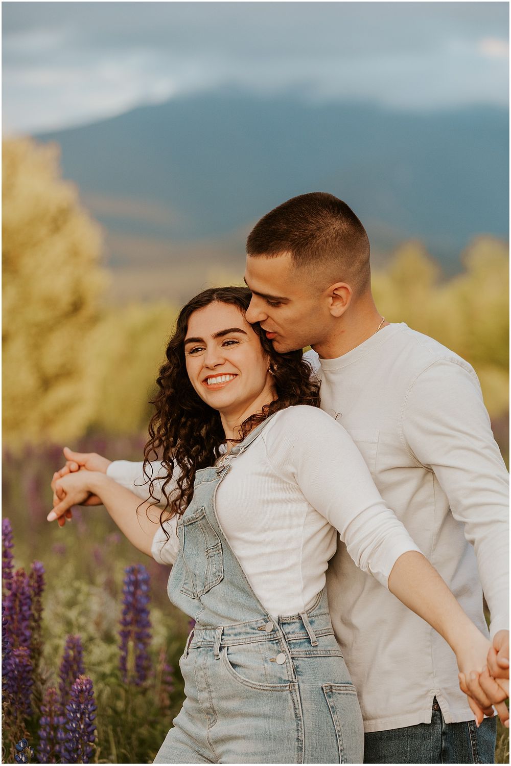 A couple embracing during their engagement picture session