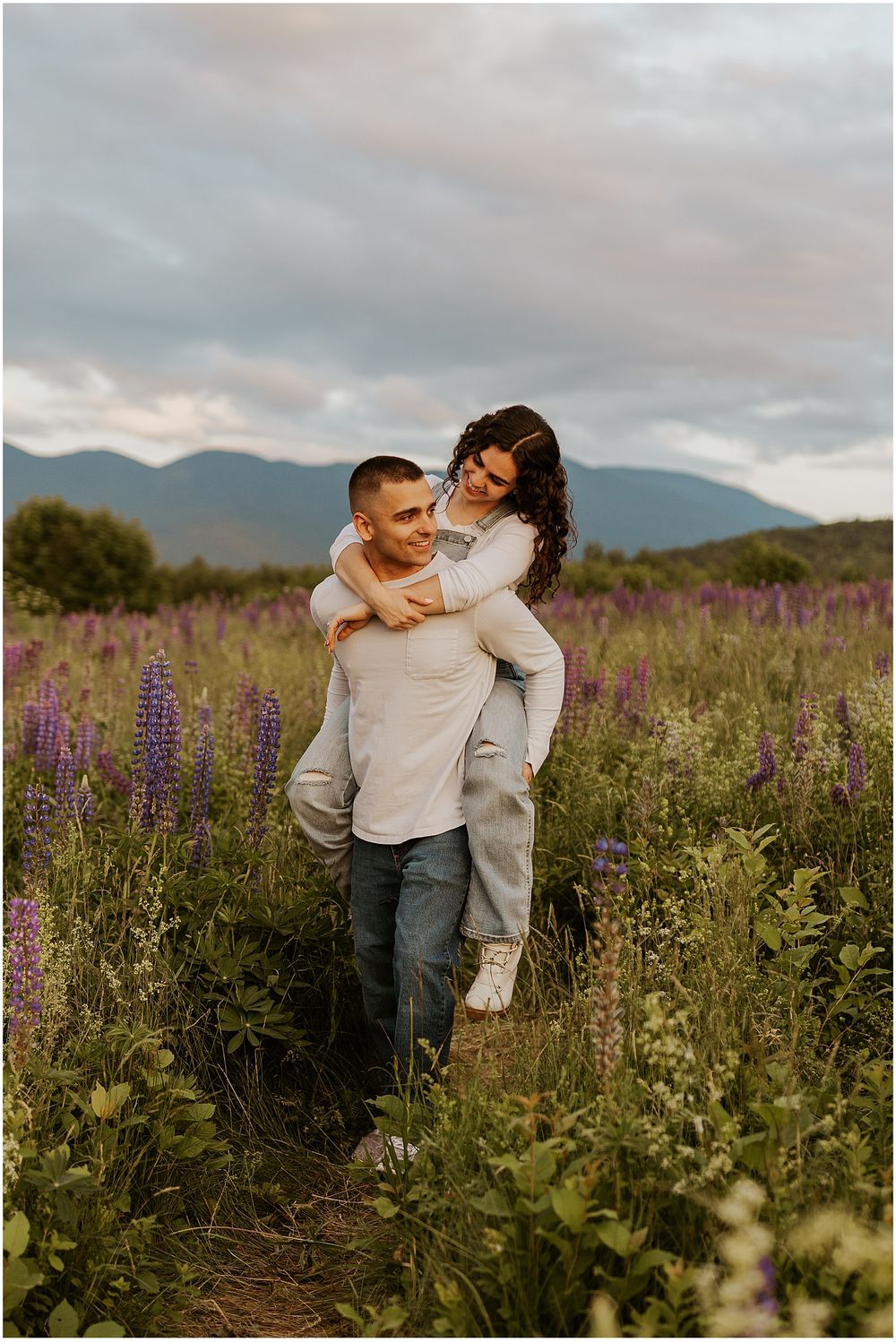 A couple taking engagement pictures in New Hampshire's White Mountains