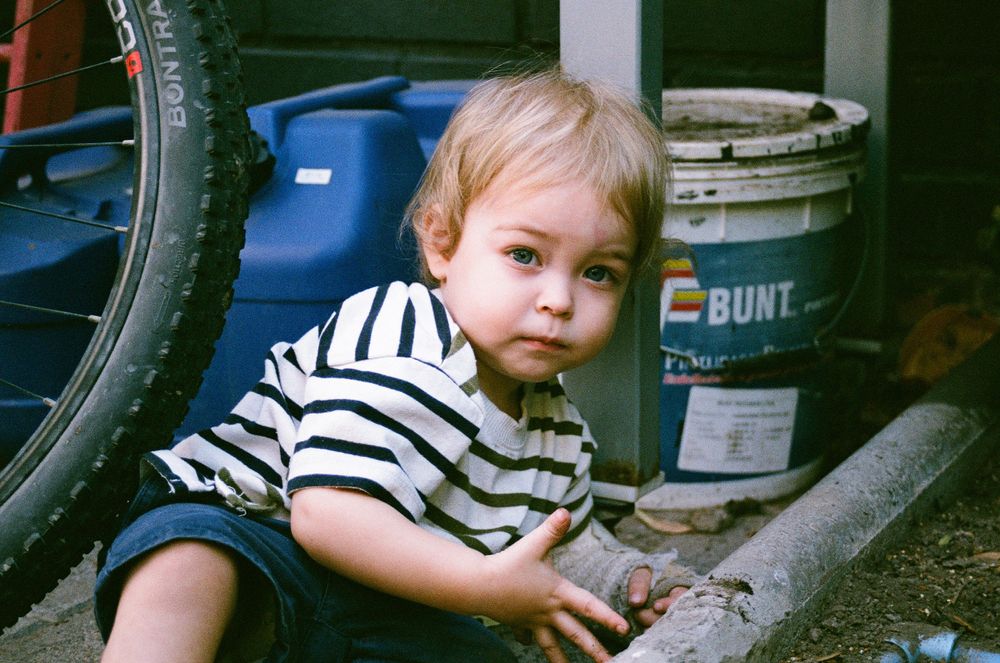 A film photographer in Perth reflects on motherhood, family, and capturing real moments through honest, emotive imagery