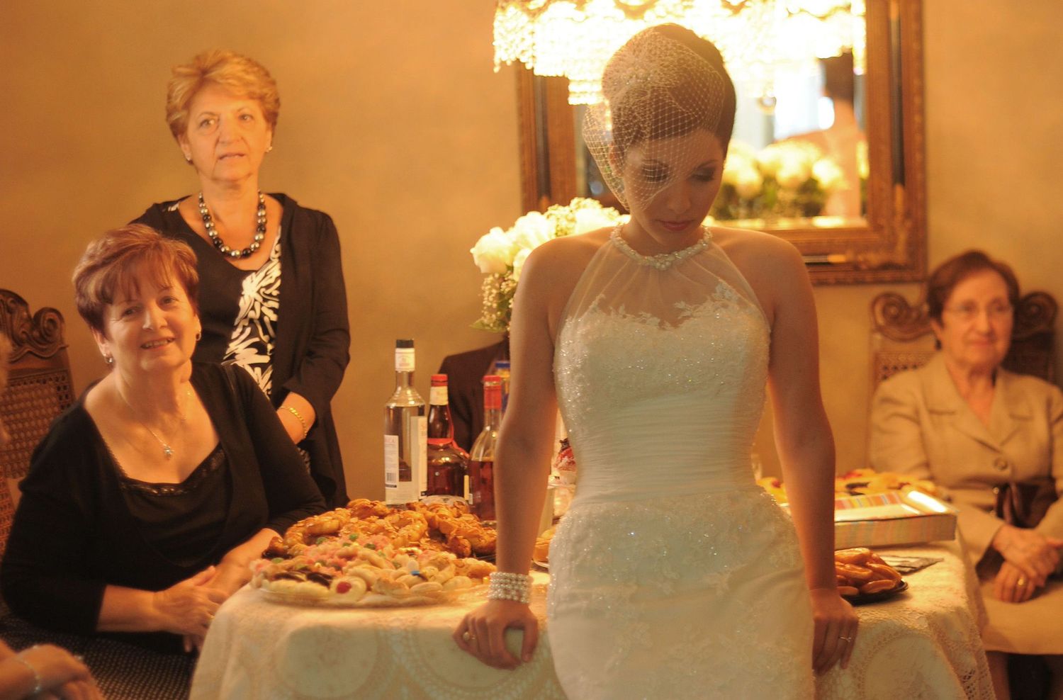 Wedding reception scene with elegant table setting and formal wear.