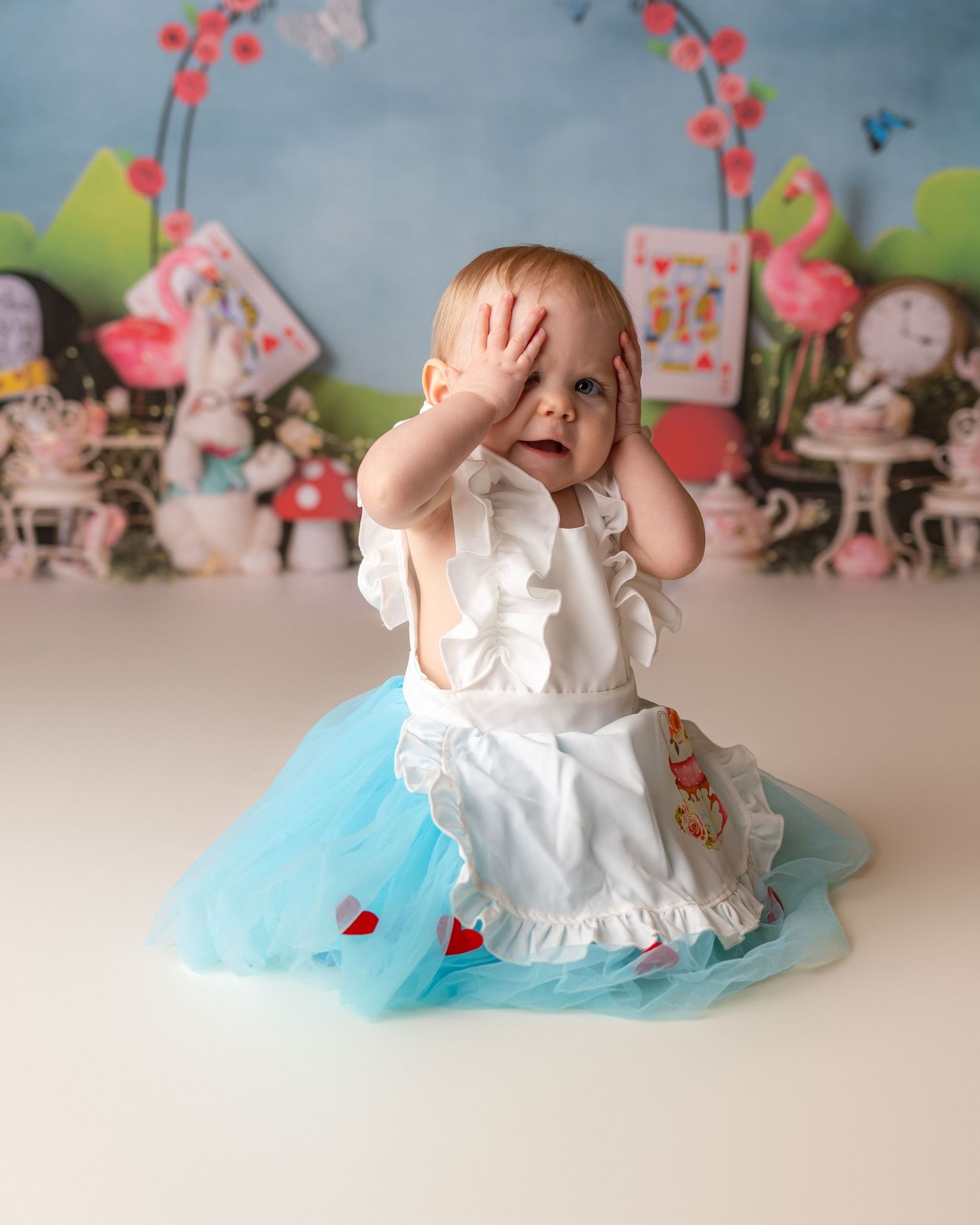 Professional milestone toddler cake smash photo - Alice in Wonderland theme