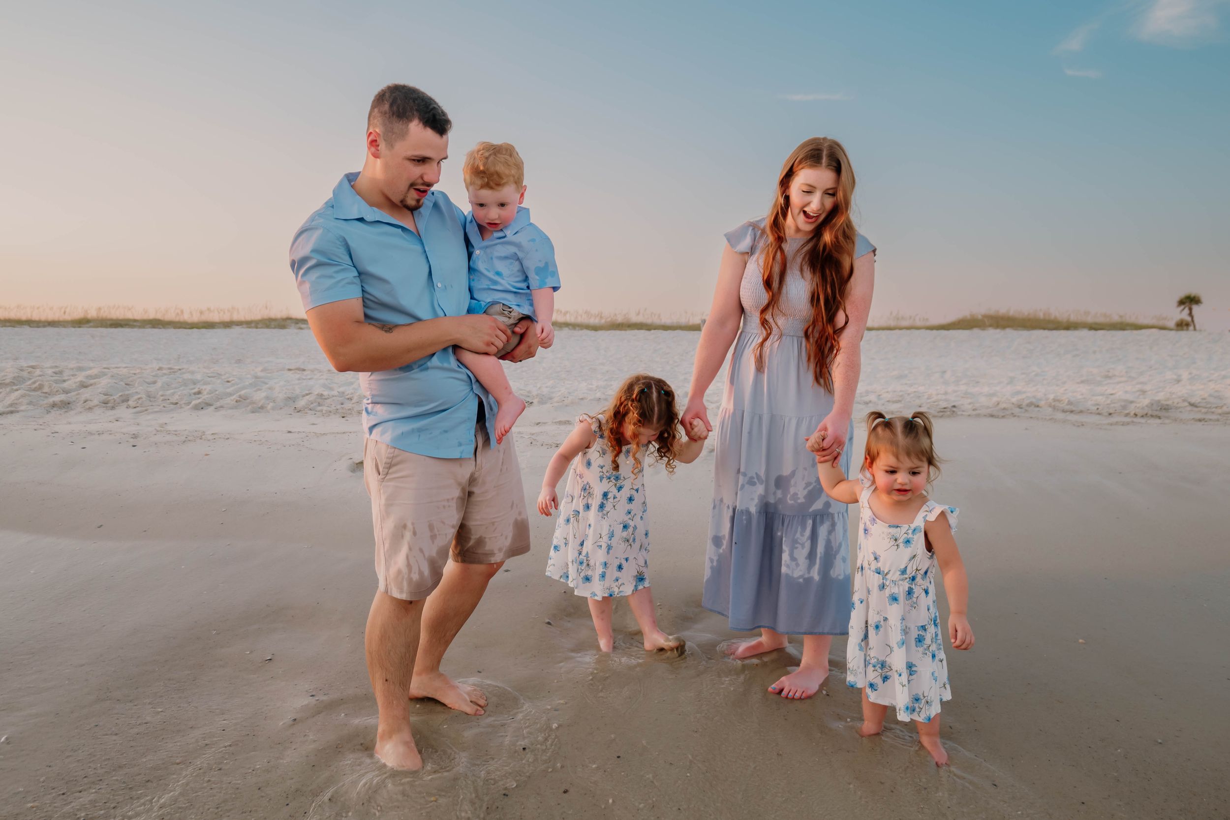 Fun family photo session Family on beach in Orange Beach Alabama Young Children with Parents
