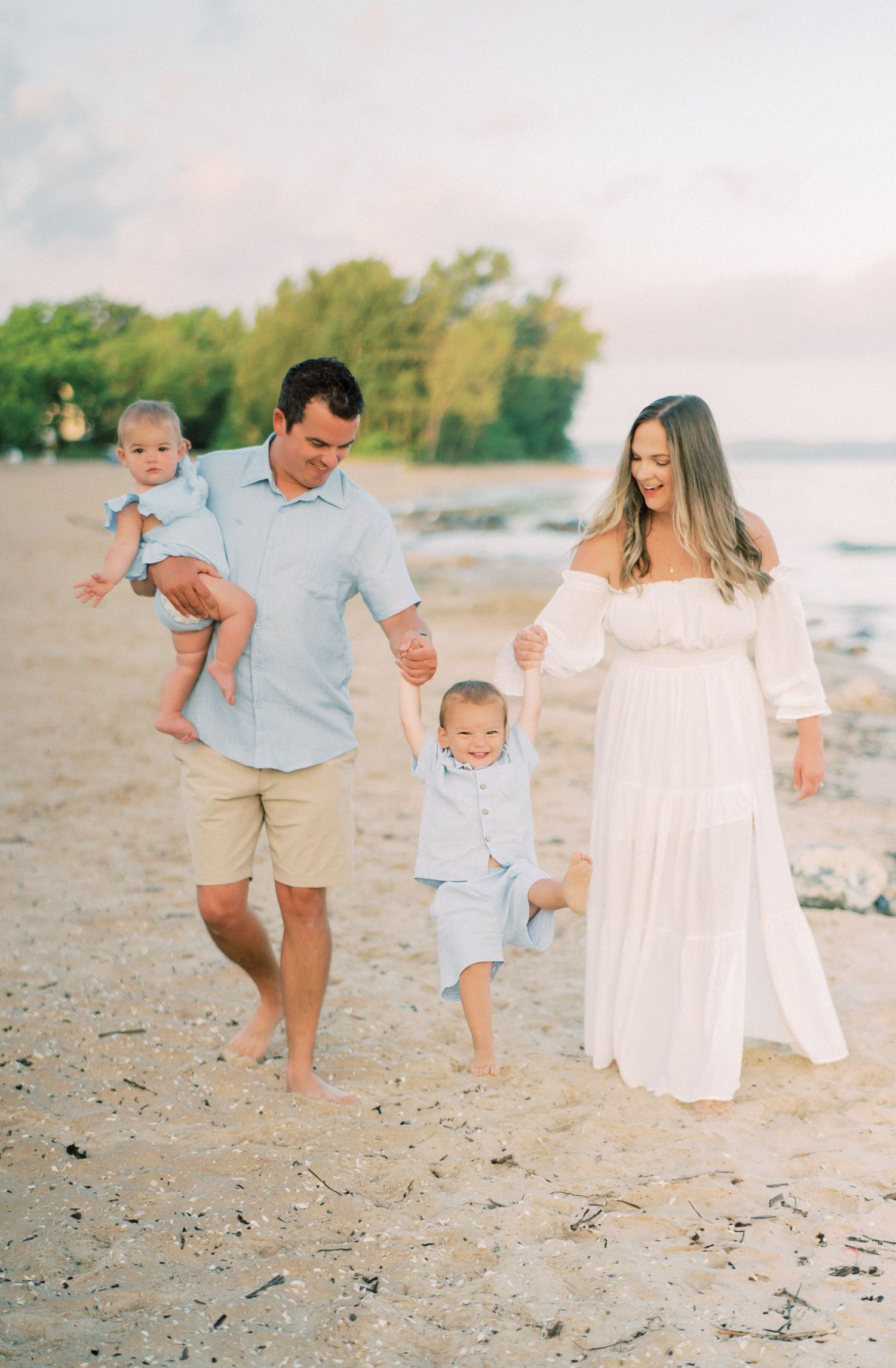 A candid family moment unfolds across multiple frames as they stroll together along a sunny beach shoreline.