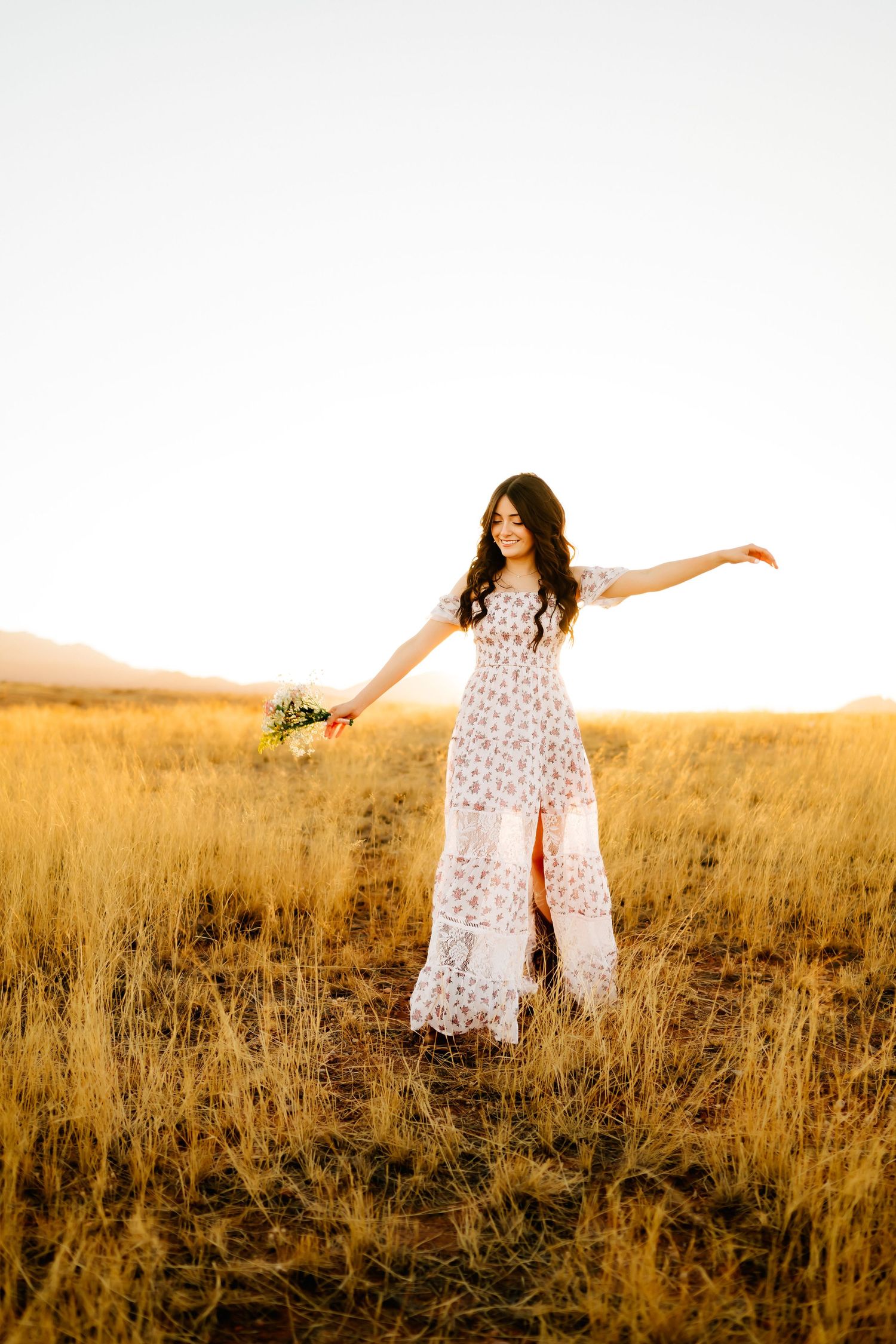 Carefree senior session in golden grasslands near Sierra Vista AZ