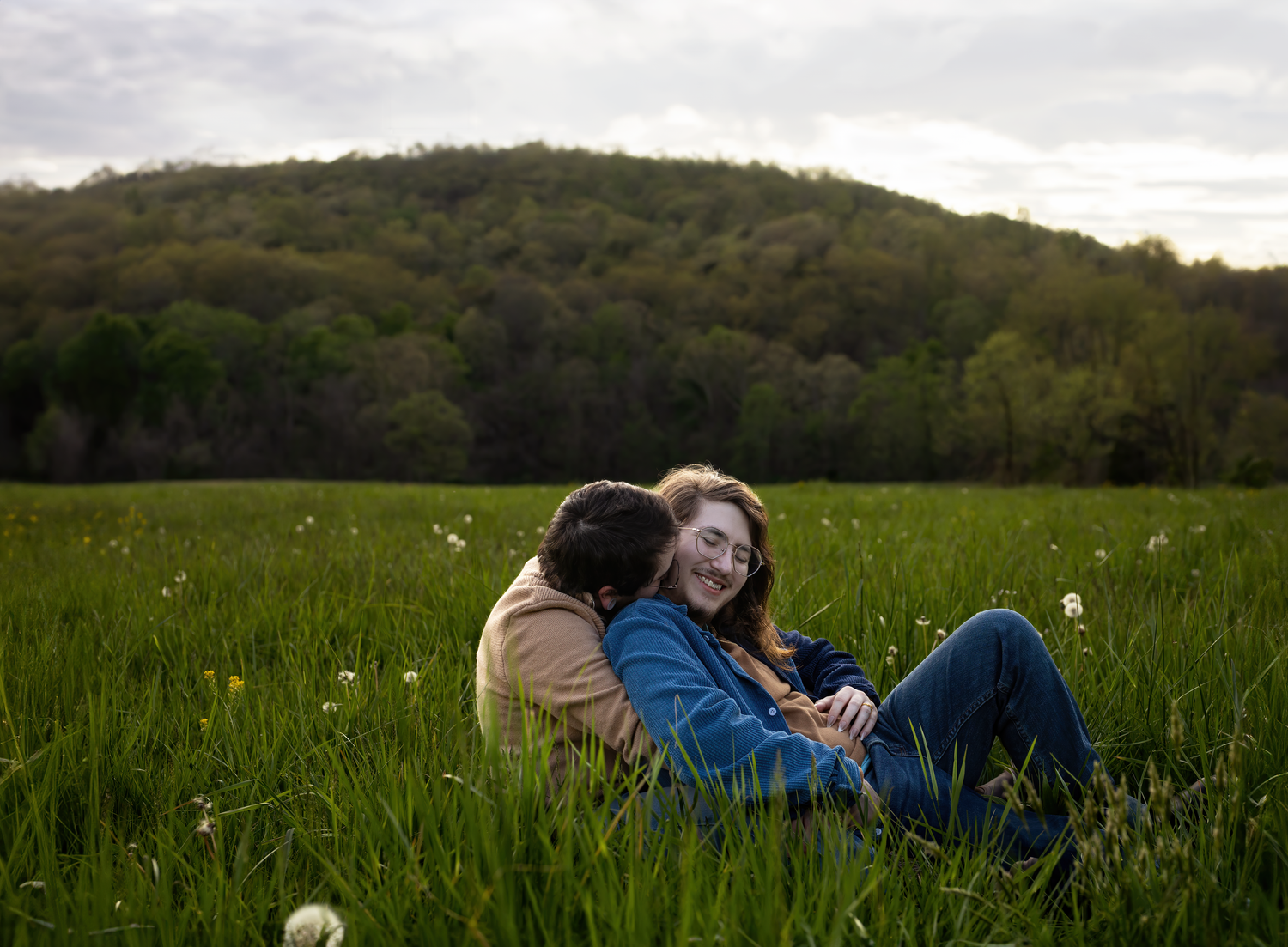 LGBTQ engagement photo shoot with natural mountain backdrop in Kentucky
