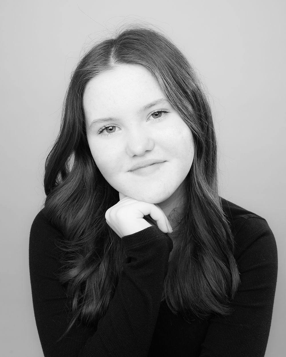 Child actor smiling during a professional headshot session in studio lighting — photographed at Abigail’s Studio, Buckinghamshire