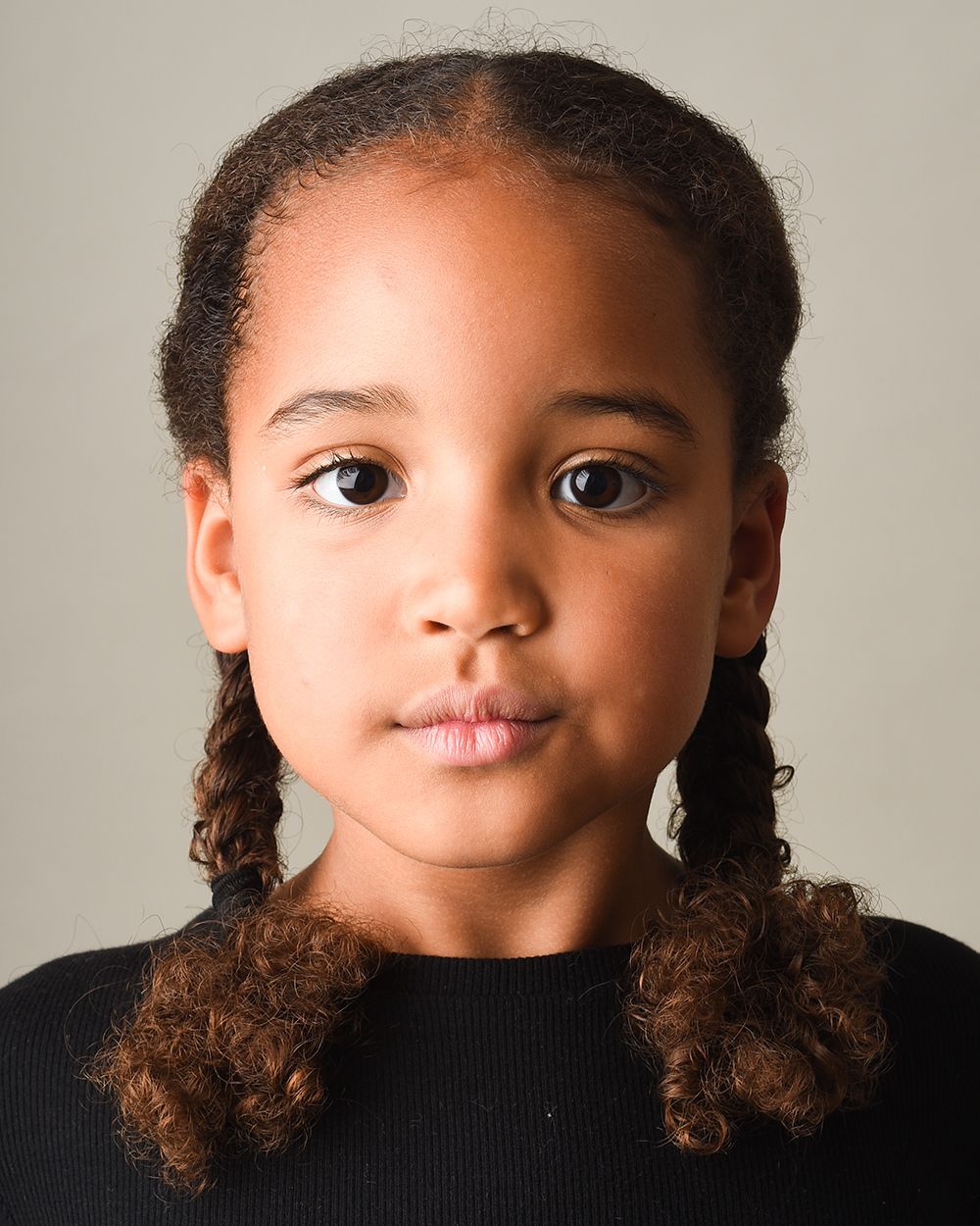 Thoughtful, dramatic headshot of a young performer — portrait by Abigail’s Studio in Buckinghamshire