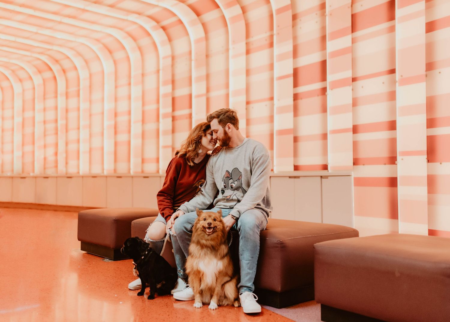John & Emily anniversary photos at Disney's Art of Animation lobby & their dogs. Cred: LexTakePix