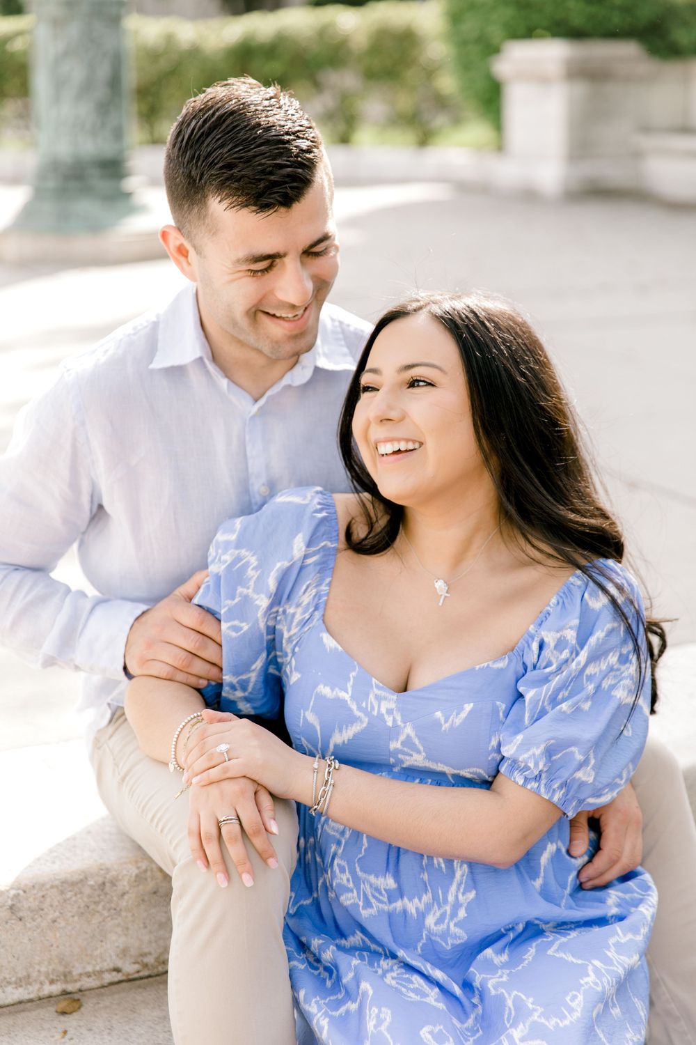 Romantic engagement photo of couple in the courtyard of Jockey Hollow Bar & Kitchen in Morristown, NJ.