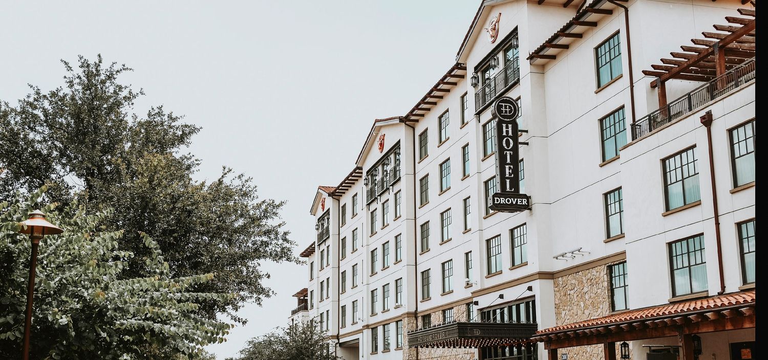 a candid photo of the entrance of the hotel drover in the fort worth stockyards