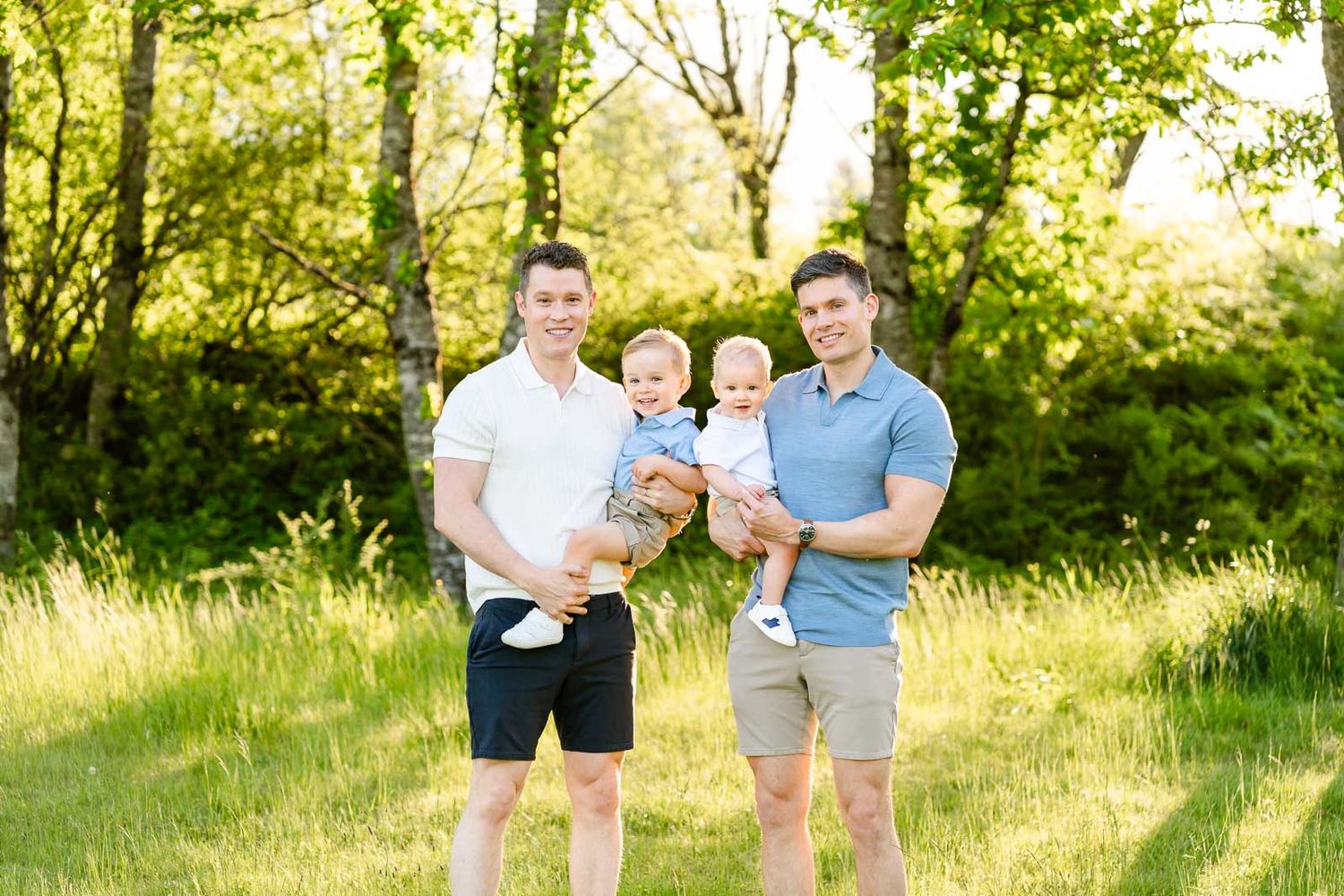 Fathers pose with their kids at sunset in Tanner Landing Park.