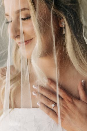 Close-up portrait series showing soft, gentle expressions against a light background.