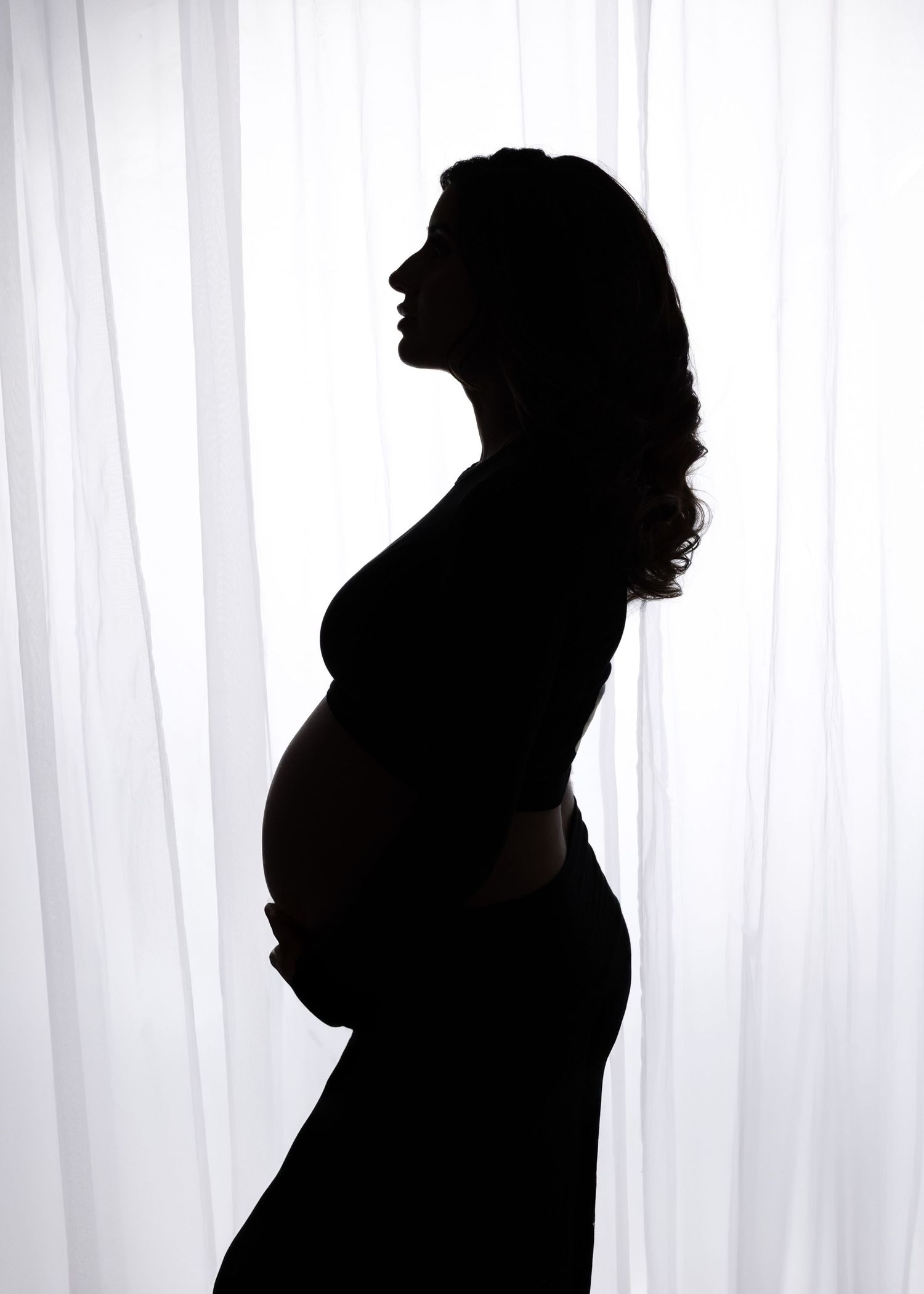 Gorgeous Rumneet awaits her new baby's arrival. Cloverdale. Surrey. Maternity Photography bump photos. Sleek black dress with cutout.