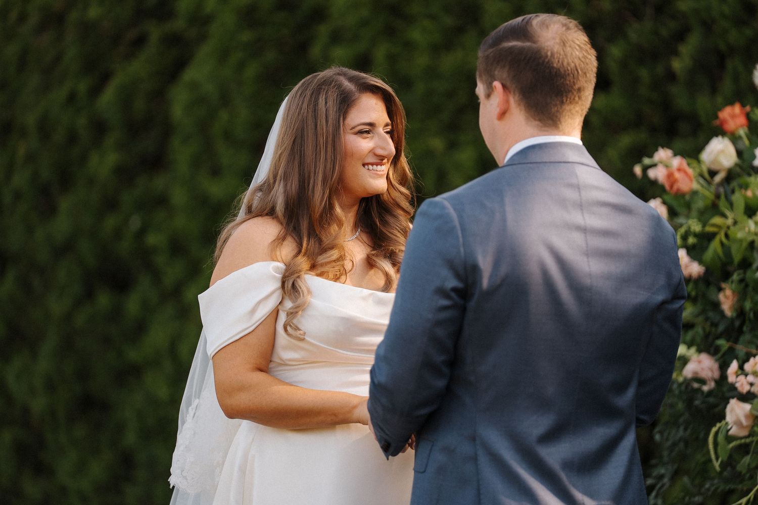Romantic outdoor wedding ceremony featuring close up shots of the bride and groom's first dance and celebration.