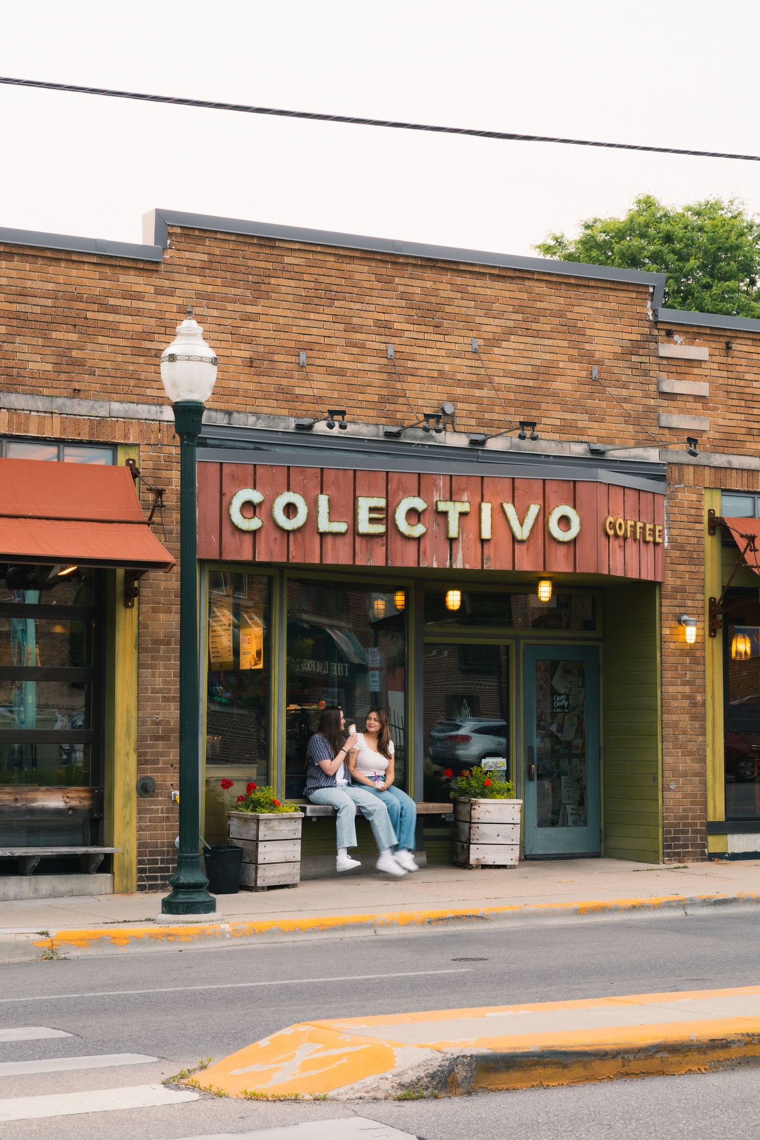 madison wi couples engagement photographer professional photos monroe street colectivo chocolate shoppe ice cream date night lgbtq verona