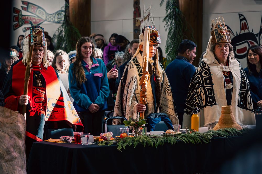 People in traditional Haida regalia gathered at the Haida Title event in Skidegate.