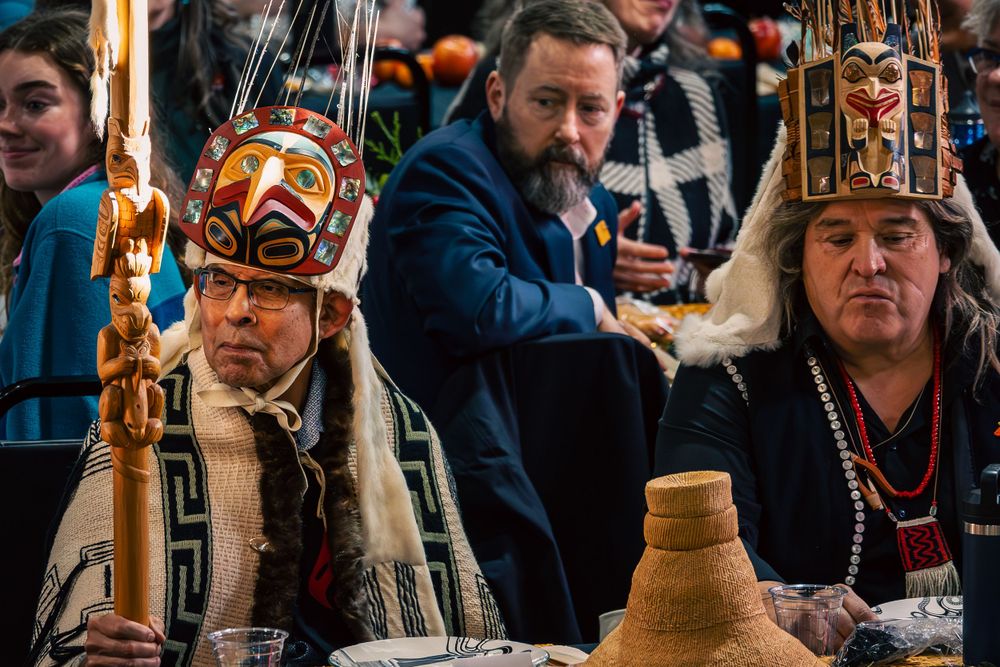 Hereditary Chiefs wait as the Prime Minister of Canada speaks on the Haida Title agreement.