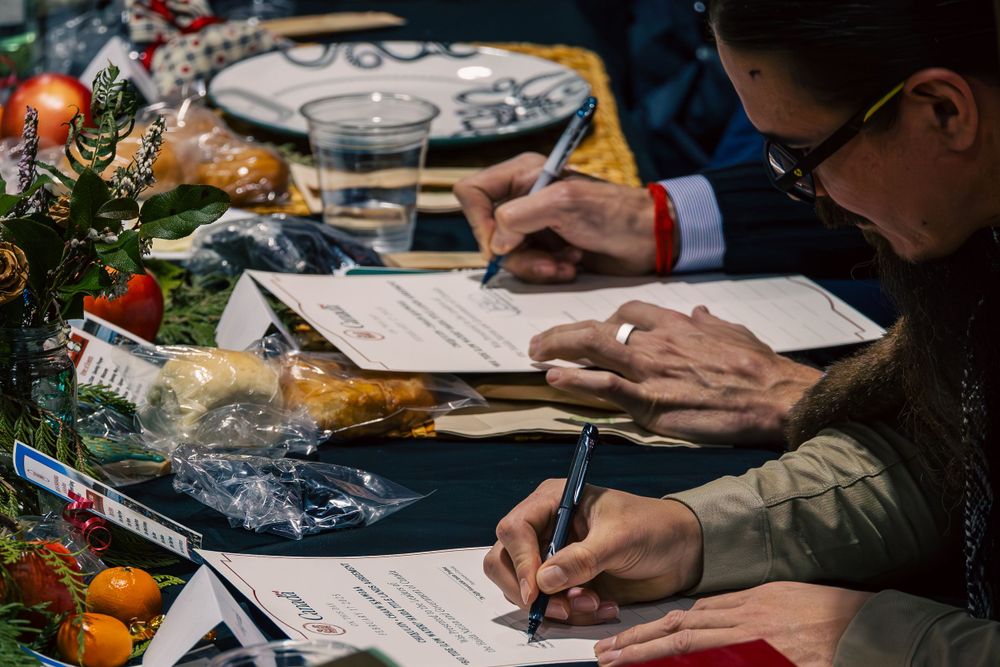 The Prime Minister signs the Haida Title agreement at the community hall in Skidegate British Columbia.