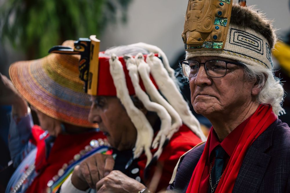 Traditional ceremonial attire and regalia is worn during the Haida Title signing.
