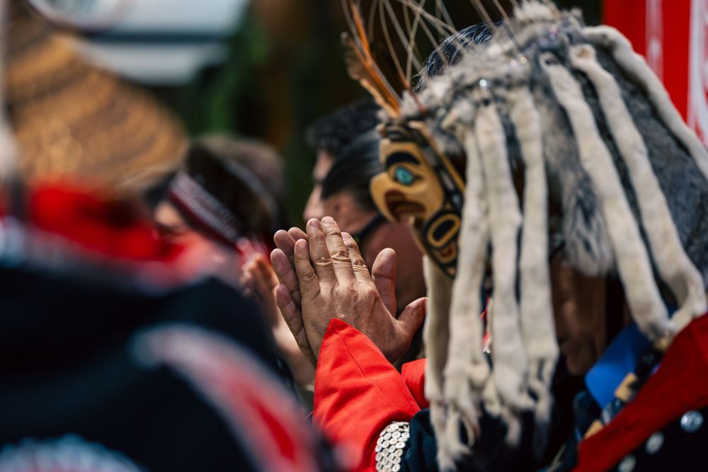 A hereditary chief applauds the Haida Title agreement in Skidegate Haida Gwaii.