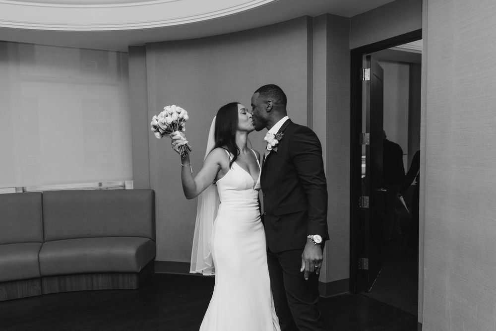 Sequence of black and white wedding photography shots showing tender moments between a bride and groom in formal attire.