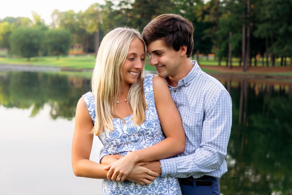 Emotional embrace after surprise proposal at Athens Country Club, captured by Athens GA photographer Ansley Howe