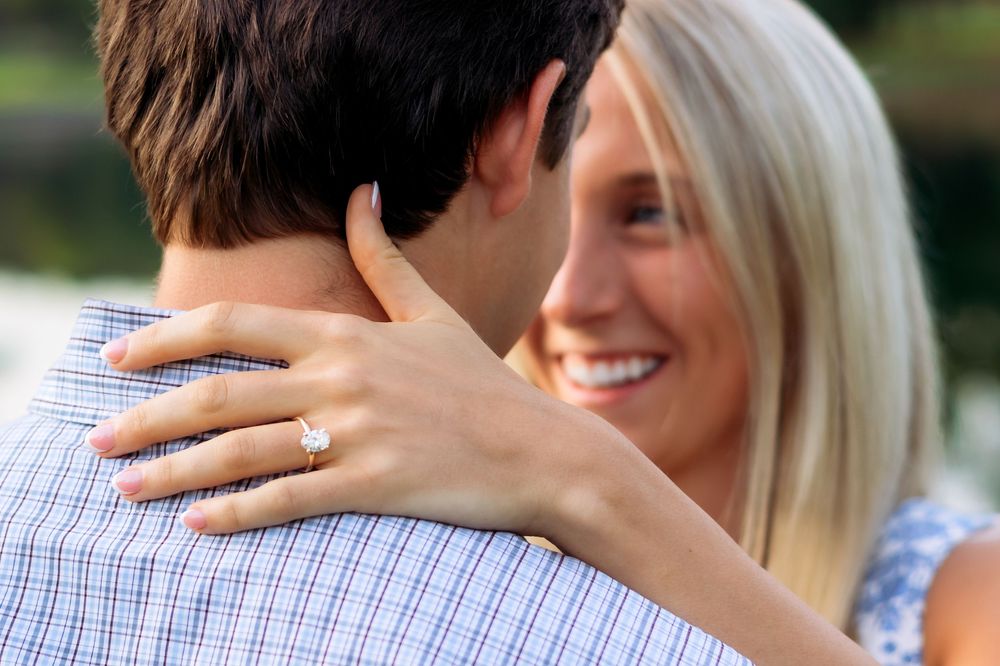Emotional embrace and close up of ring after surprise proposal at Athens Country Club, captured by Athens GA photographer Ansley Howe