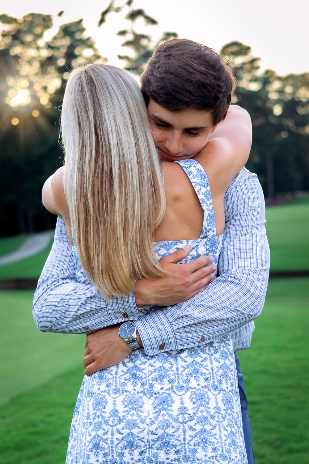Emotional embrace after surprise proposal at Athens Country Club, captured by Athens GA photographer Ansley Howe