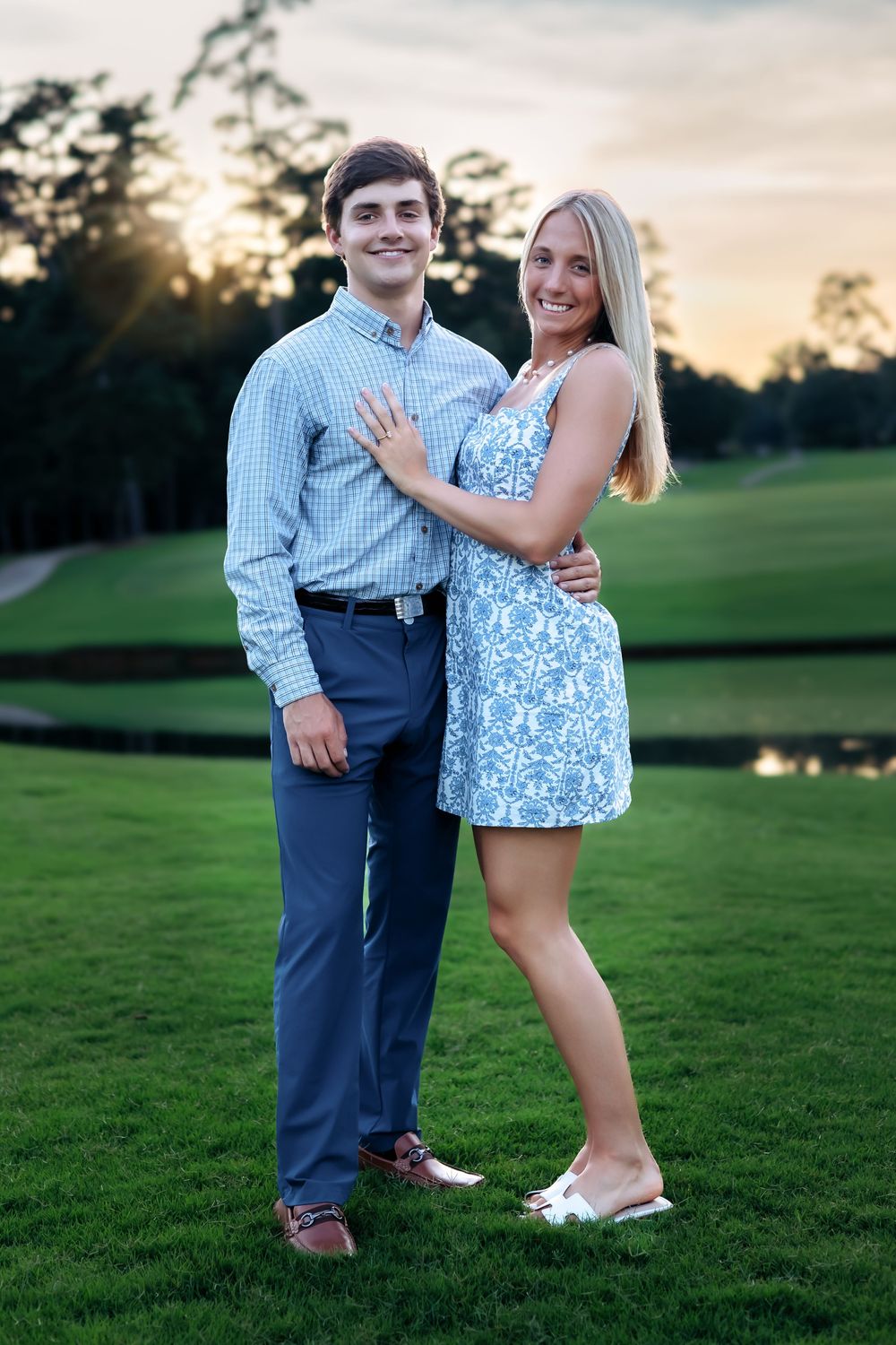 Newly engaged couple posing after saying yes at Athens Country Club — photographed by Ansley Howe Photography