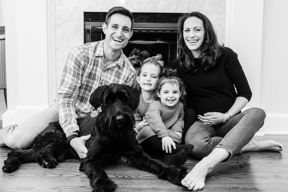 Family portrait of the Drenkhan family, captured outdoors during a joyful moment together