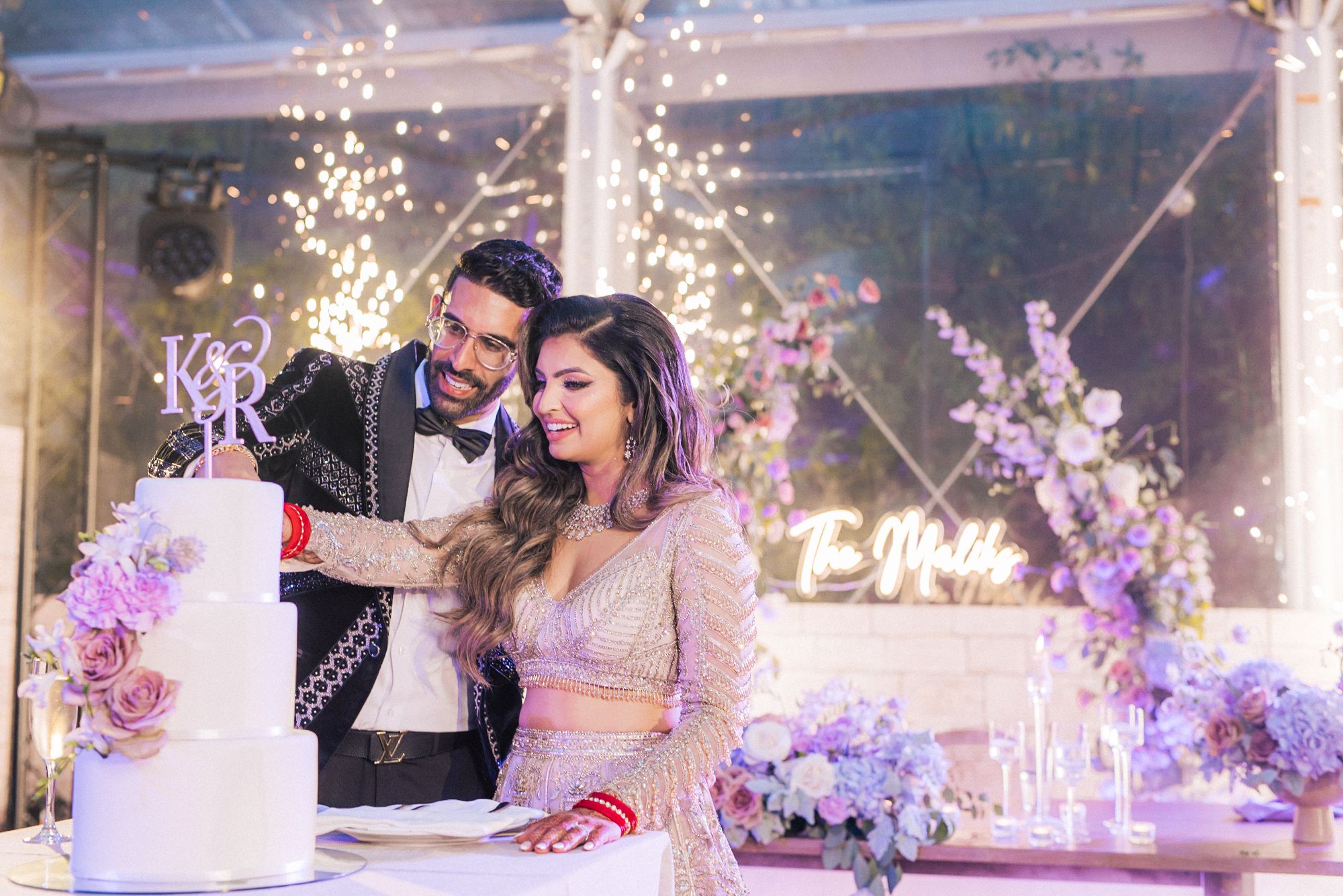 A magical Indian wedding reception at Forte da Cruz, overlooking the Atlantic Ocean. by a Lisbon Wedding Photographer