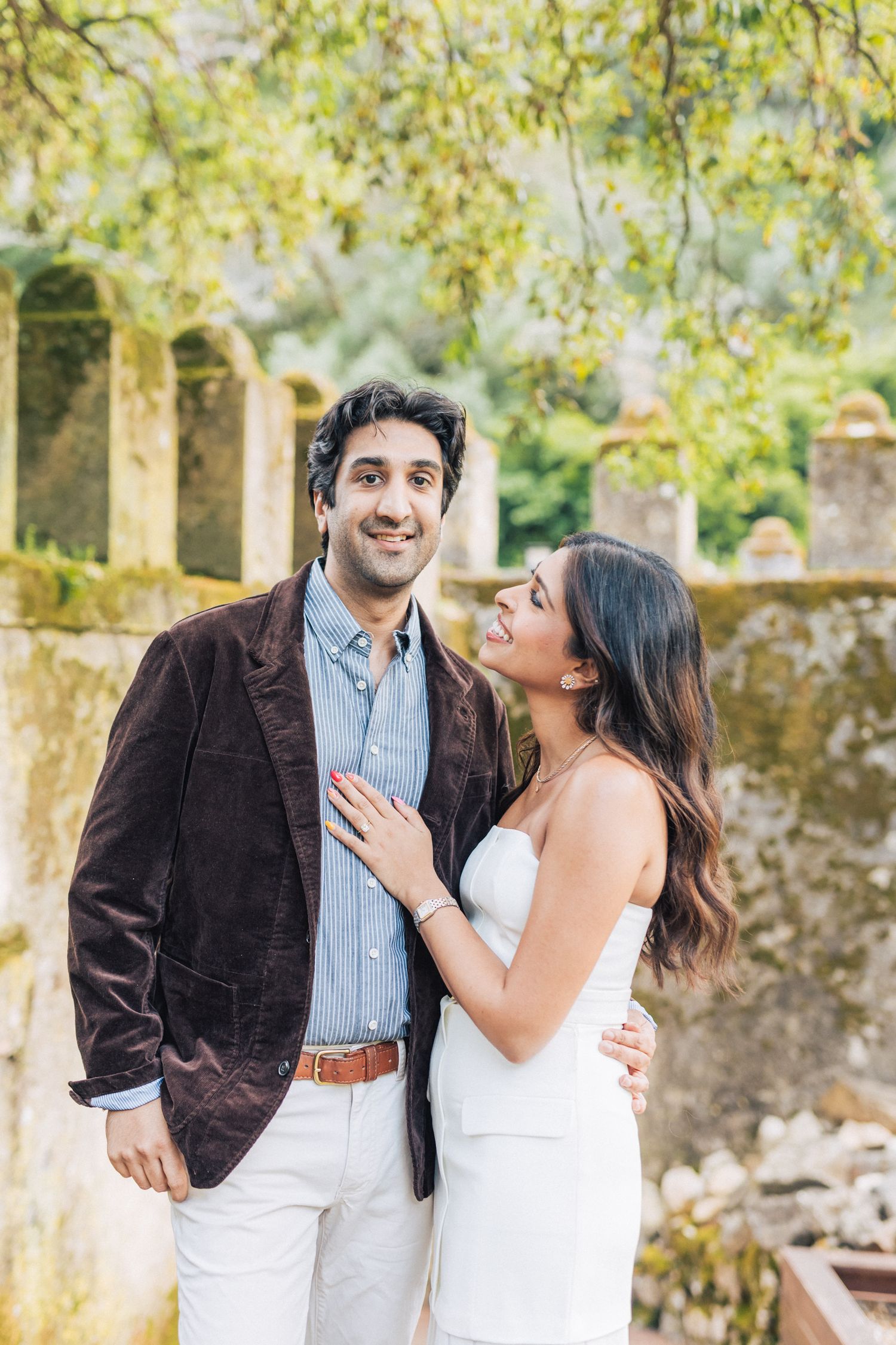 Romantic engagement photo-shoot in Sintra, Portugal, with an Indian couple exploring Penha Longa. By a destination wedding Photographer