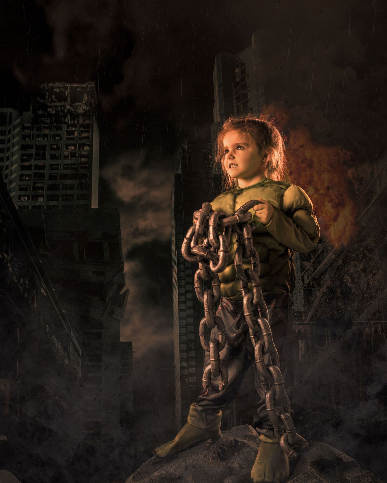 A young warrior stands holding heavy chains in a post-apocalyptic cityscape.
