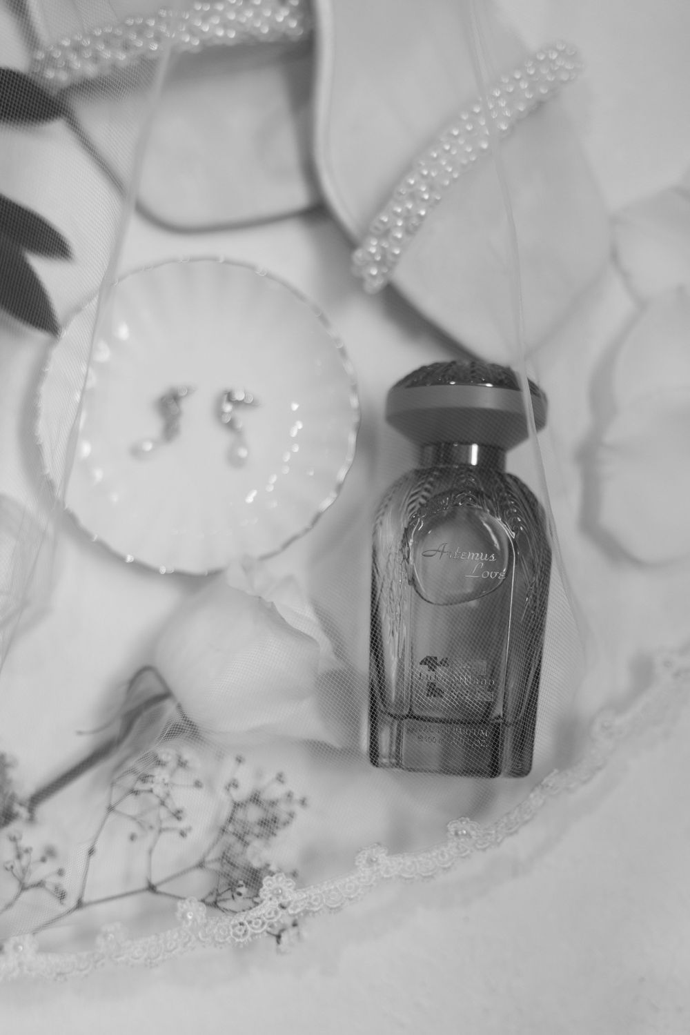 Bridal detail flat lay at wedding in Fort Pierce, Florida at The Lake House venue captured by Lindsay McDow Photography.