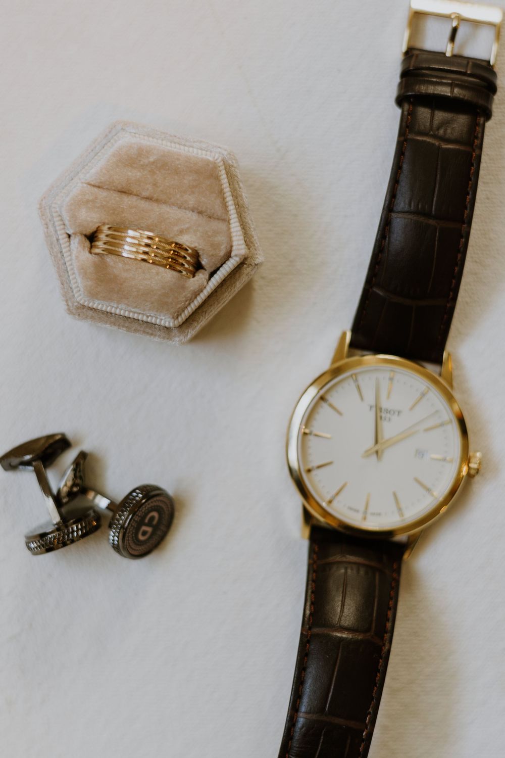 Groom detail flat lay at wedding in Fort Pierce, Florida at The Lake House venue captured by Lindsay McDow Photography.