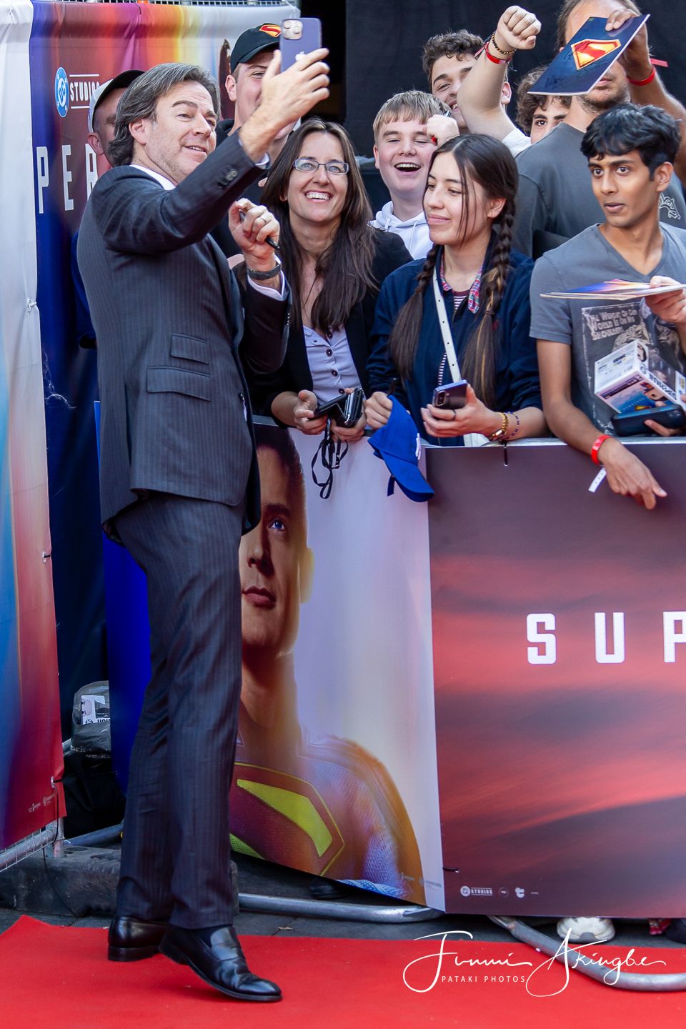 Producer Peter Safran taking a selfie with a fan at the UK Fan Event for the 2025 movie at Leicester Square, London