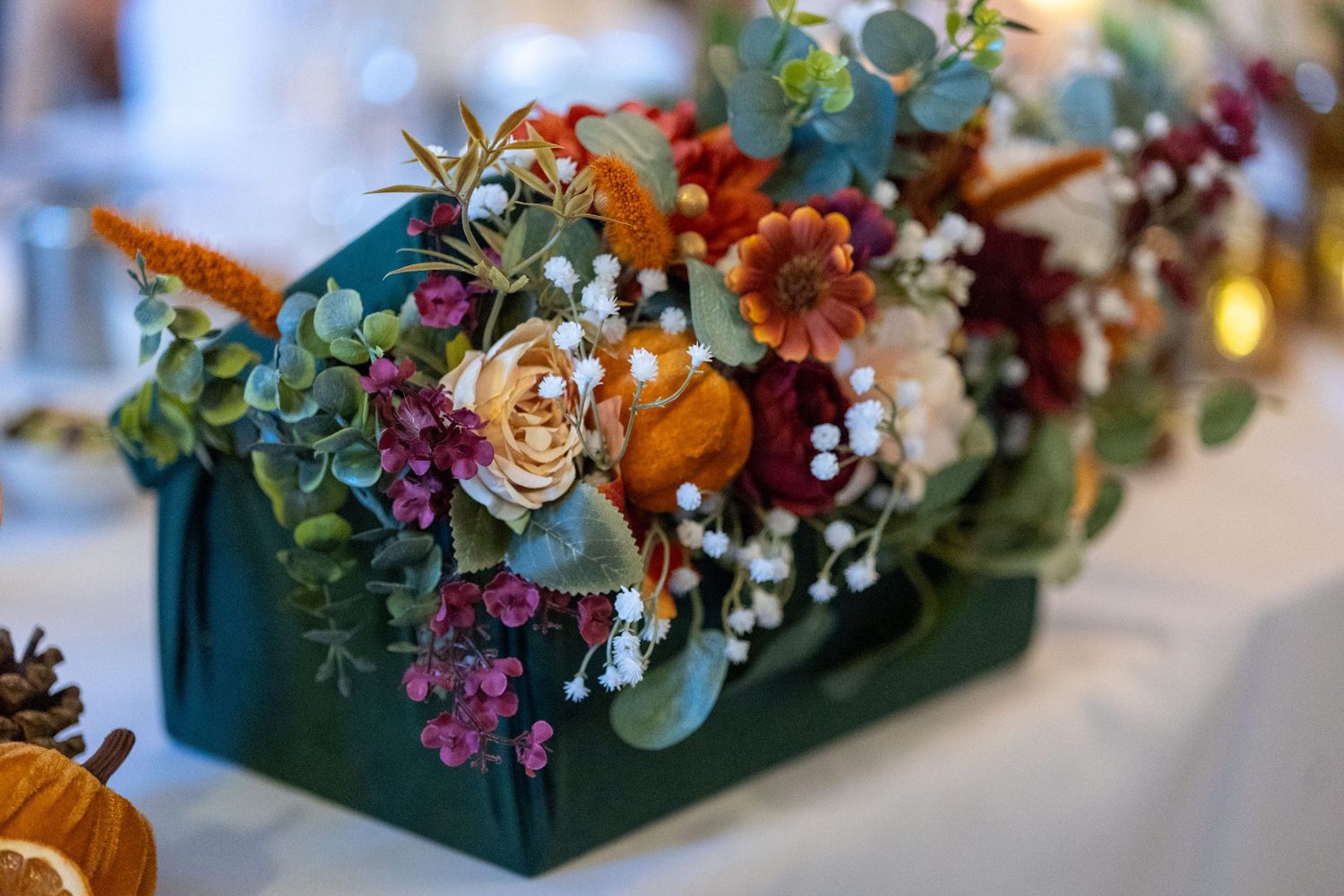dried fruit and flower autumn themed wedding decor at the Athenaeum. Stuart Morris Photography Liverpool city centre wedding photographer