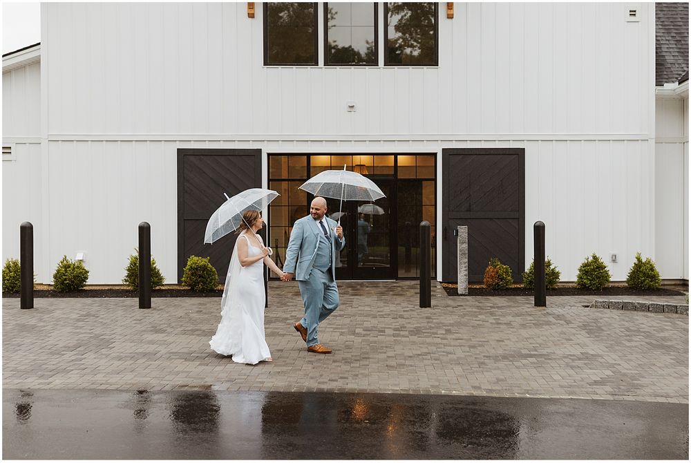 Bride and groom taking portrait photos at Hyla Brook Estate