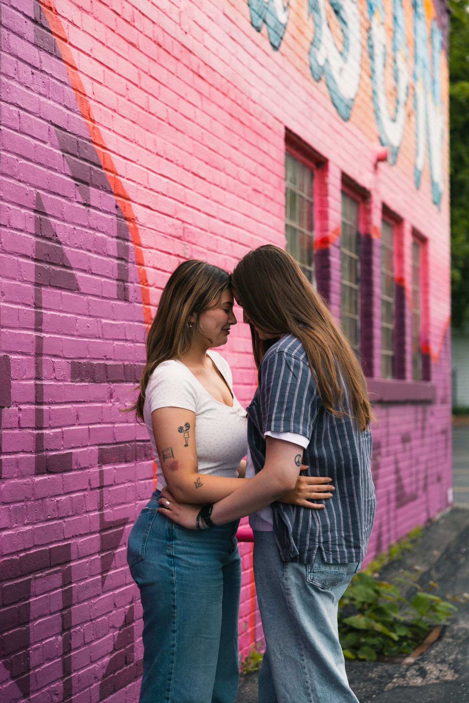 madison wi couples engagement photographer monroe street mural triangulador lauer realty group lgbtq colorful unique photos wisconsin urban