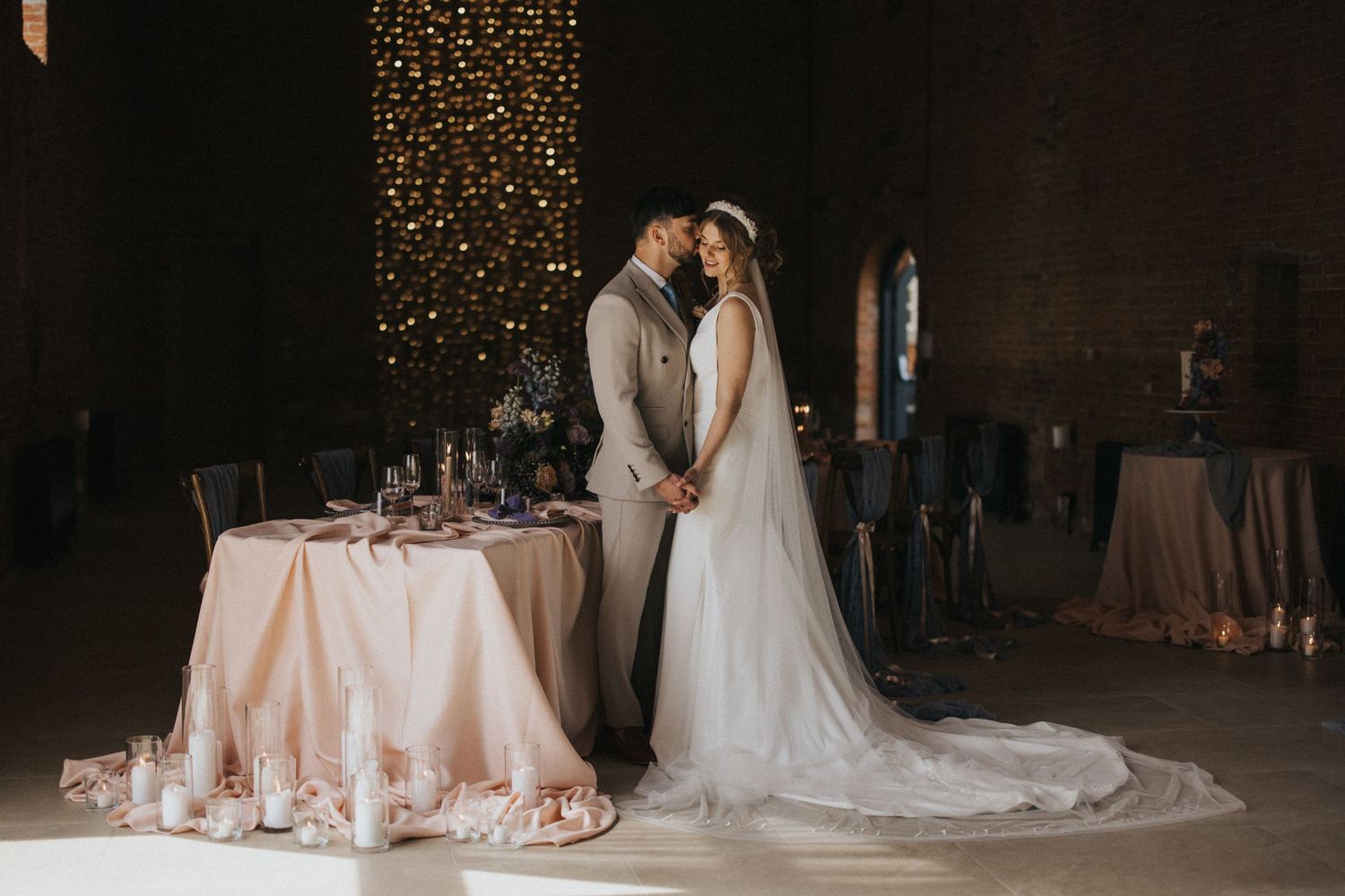 A series of wedding reception photos showing elegant table settings and flowing white wedding gowns in a rustic venue.