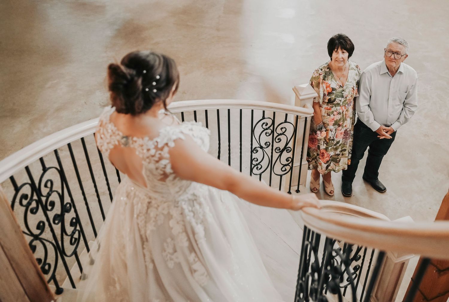 Emotional first look between bride and her teary-eyed grandparents