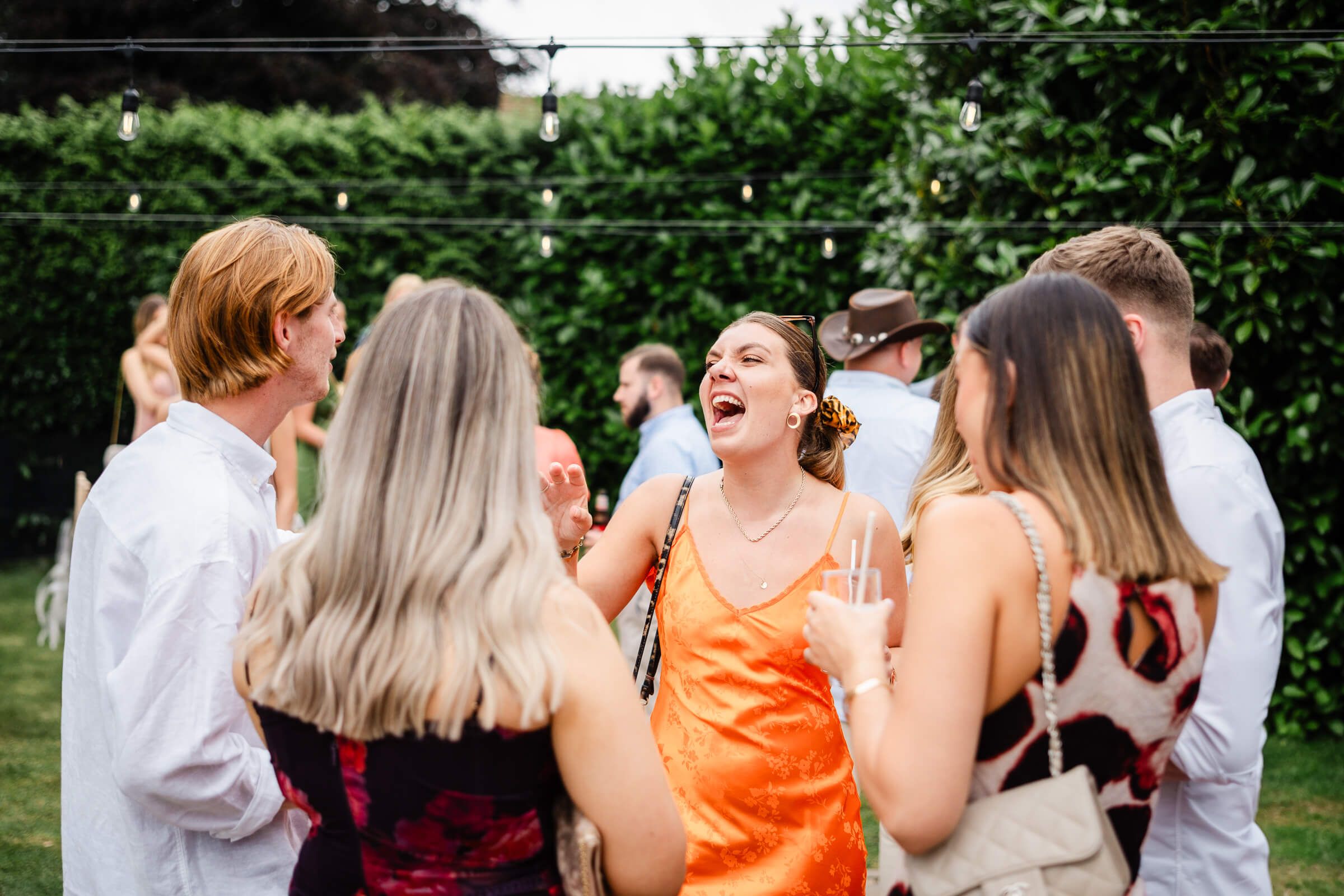 guests having a great time at family home wedding in Oxted Surrey