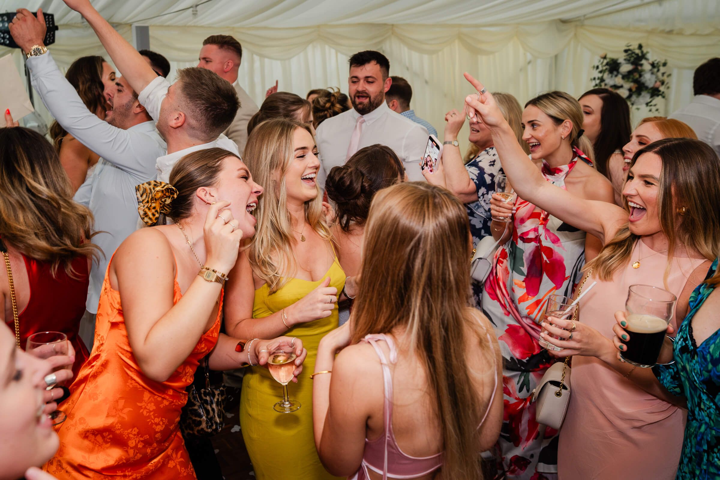 guests dancing at a home wedding