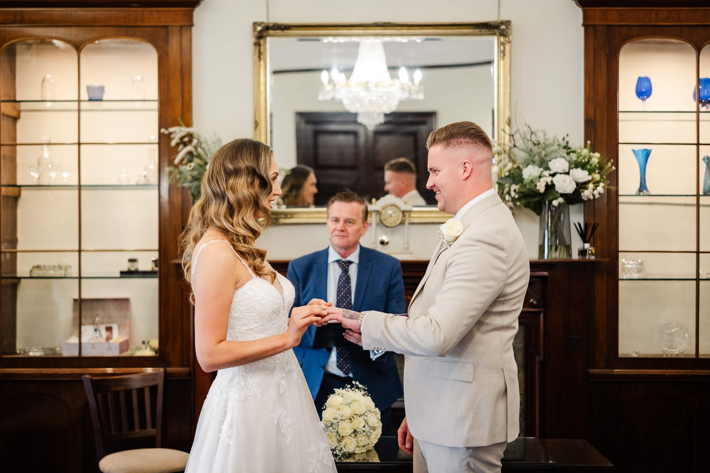 Bride and groom during wedding Leatherhead Registry Office,