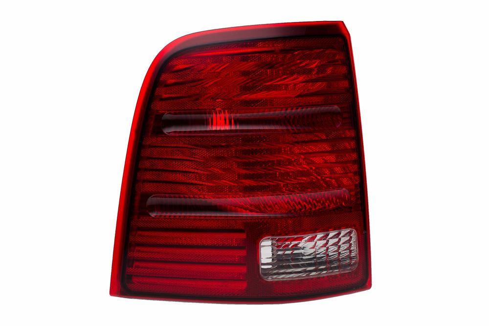 Red tail light assembly for a car with horizontal striped pattern and clear lens sections showing modern automotive design.