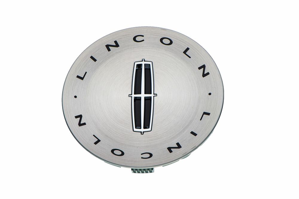 A silver Lincoln automotive wheel center cap with the Lincoln logo emblem on a light gray background.