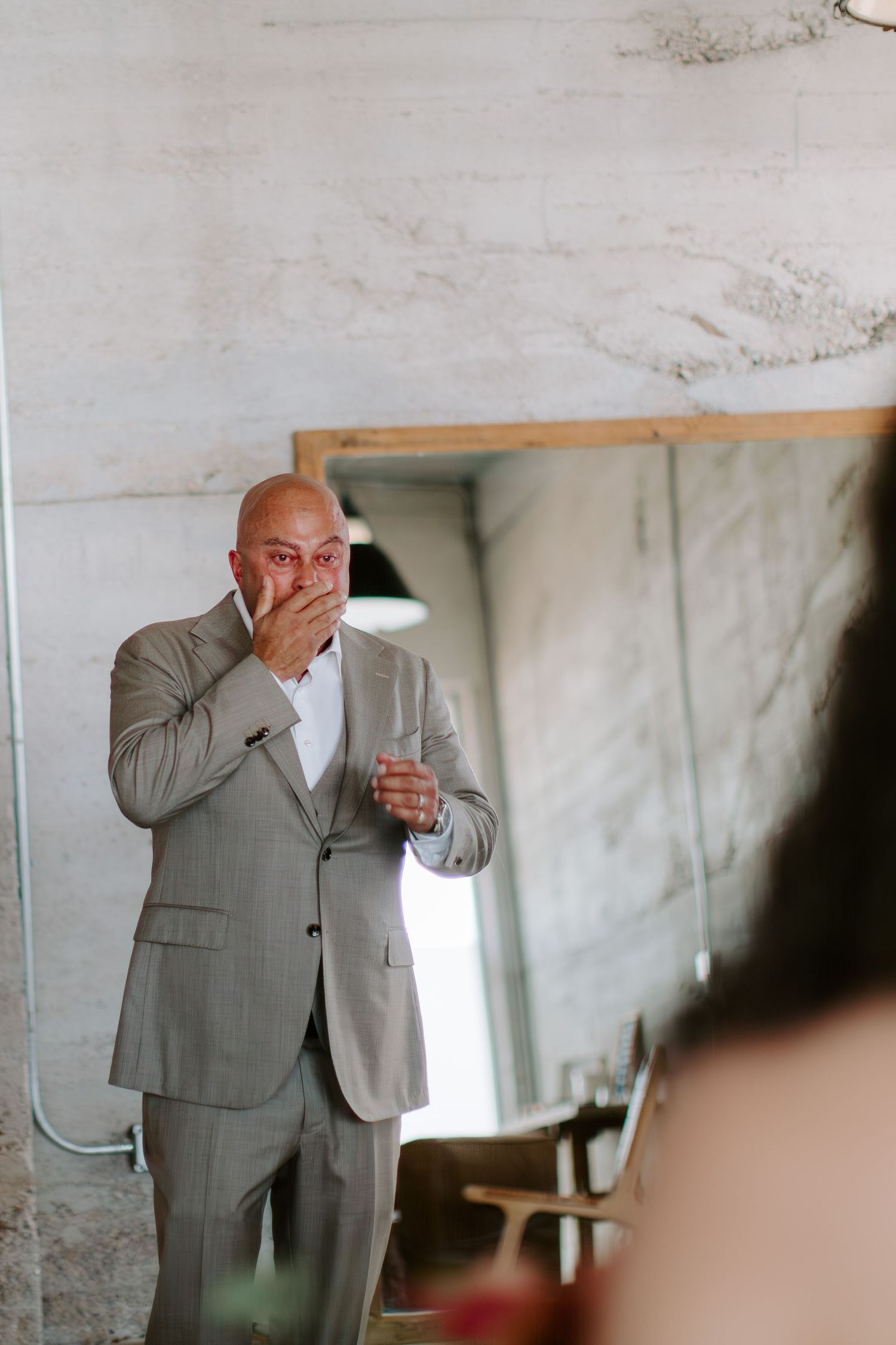 Touching moment of overwhelming emotion during a wedding first look.