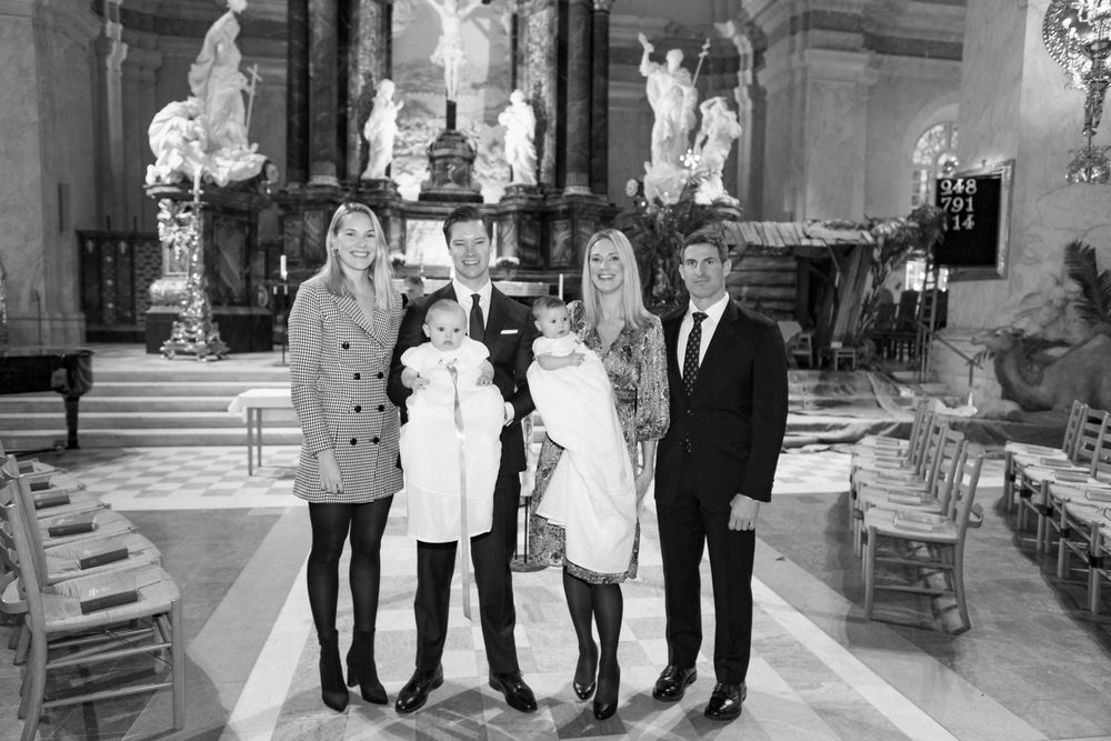 Christening. Group of people standing together in Gustav Vasa Kyrka, Stockholm.