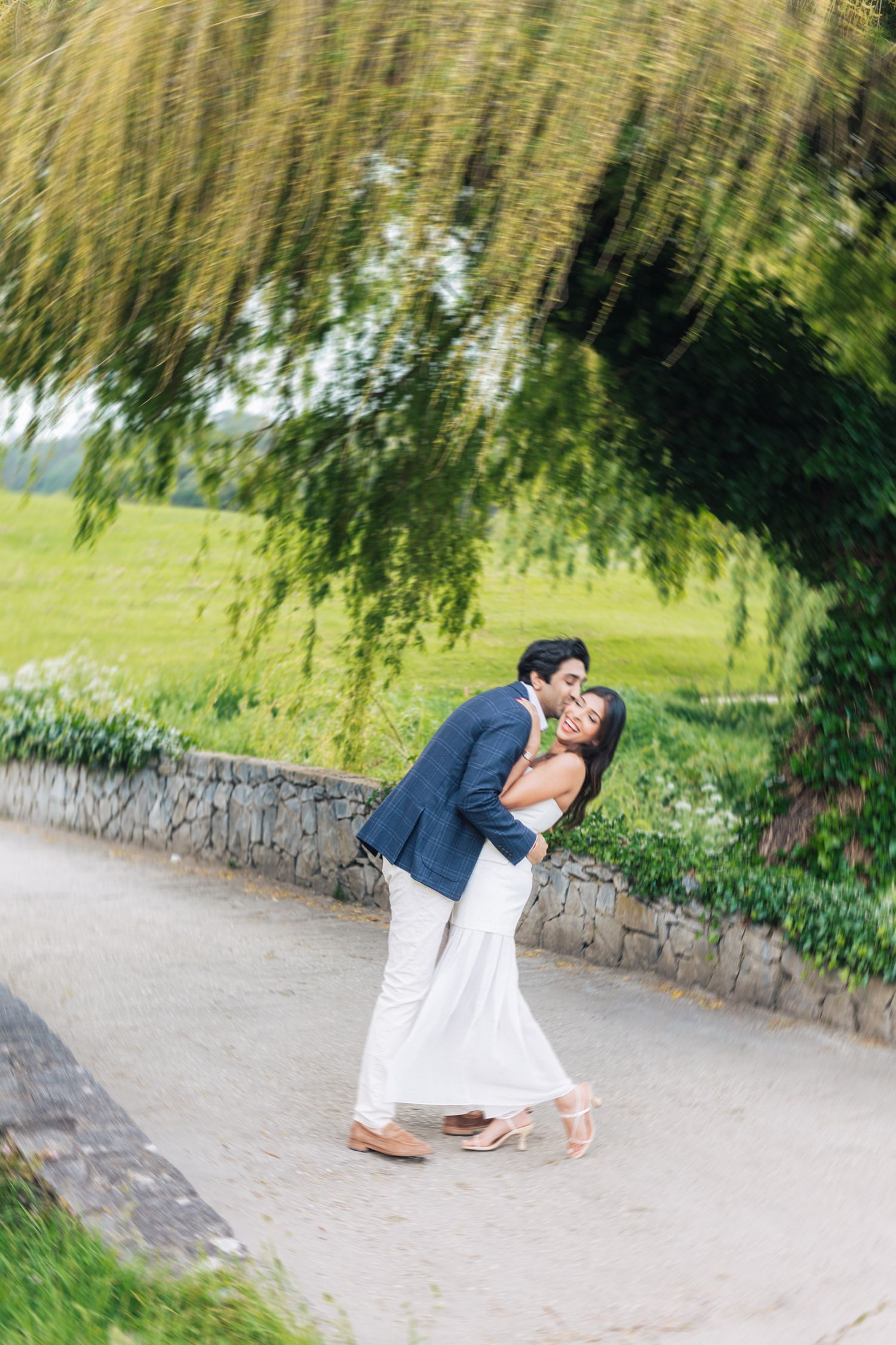 Romantic engagement photo-shoot in Sintra, Portugal, with an Indian couple exploring Penha Longa. By a destination wedding Photographer